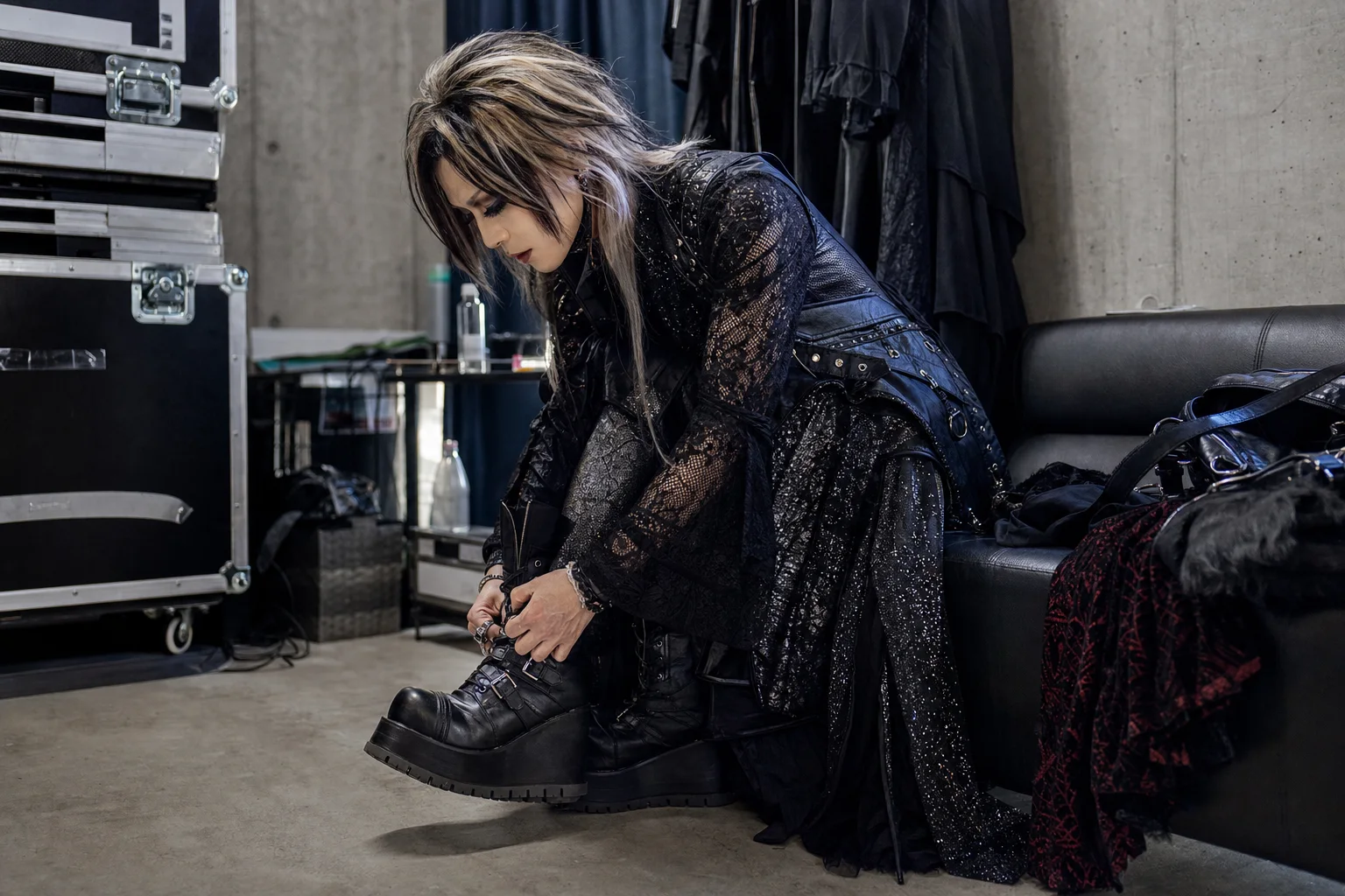 Realistic editorial lifestyle scene illustrating visual kei fashion: a respectful guide to dramatic styling
